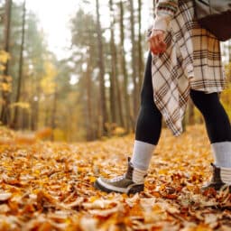 Person takes fall hike in autumn